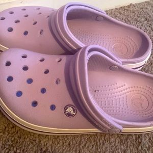 Purple and white crocs